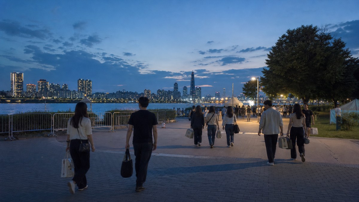 Seoul fireworks festival parking and road closures 2026 Han River arrival illustration with pedestrians and city skyline