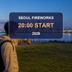 Seoul fireworks festival start time 2026 thumbnail showing a visitor checking the time beside the Han River
