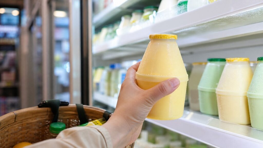 Korean banana milk where to buy 2026 thumbnail showing a chilled jar-shaped banana milk bottle in a Korean convenience store